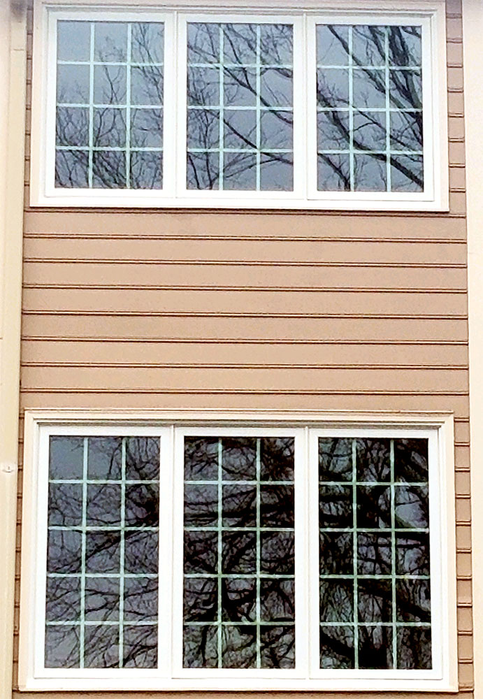 Custom-build casement windows with colonial grilles
