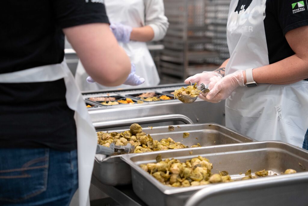 Serving food with Feed More in Richmond, Virginia