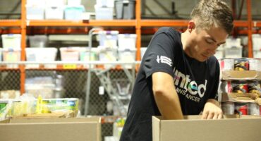 Renewal by Andersen of Roanoke staff volunteering with Feeding Southwest Virginia.
